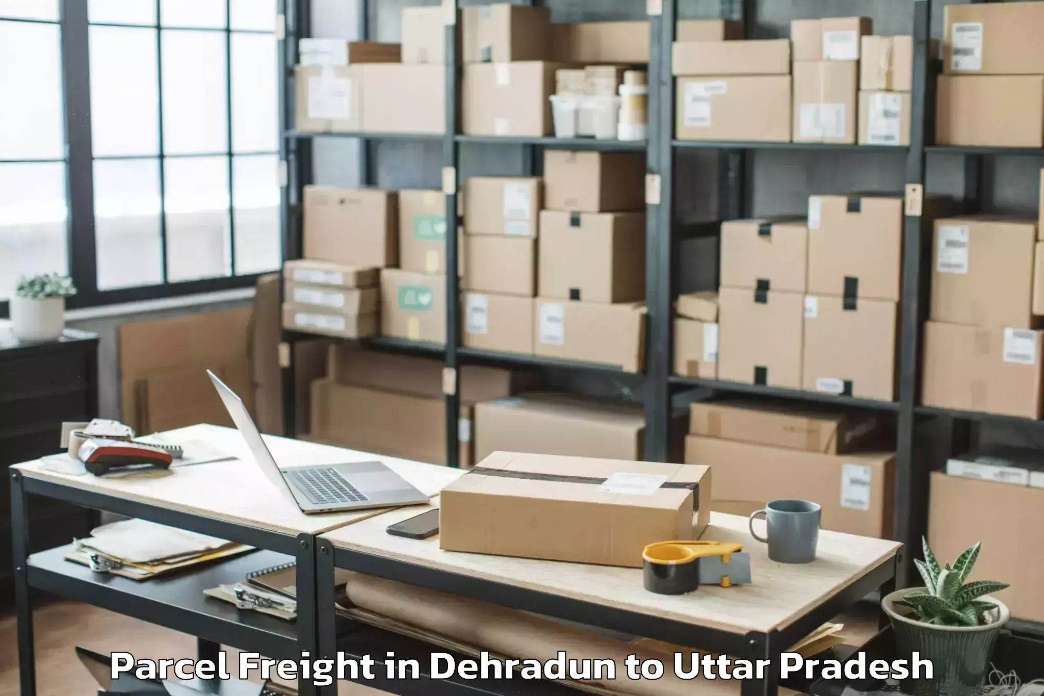 Quality Dehradun to Muhammadabad Gohna Parcel Freight